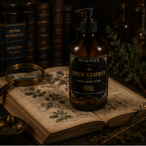 The Onyx Reserve Hair & Body Wash displayed on a dark apothecary vanity surrounded by botanical specimens and amber glass vessels.